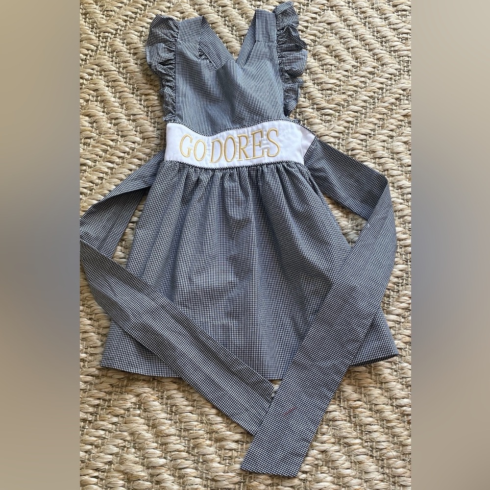 Vanderbilt black and gold apron dress with bow size 4 from Smockingbird